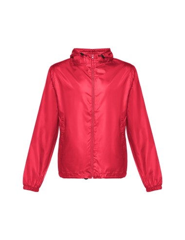 Coupe-vent pour enfant (unisexe) en taffetas 100% polyester (65 g/m²). Contient une capuche avec des bouchons de serrage et une 