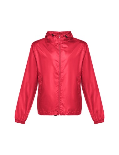 Coupe-vent pour enfant (unisexe) en taffetas 100% polyester (65 g/m²). Contient une capuche avec des bouchons de serrage et une 