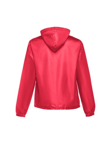 Coupe-vent pour enfant (unisexe) en taffetas 100% polyester (65 g/m²). Contient une capuche avec des bouchons de serrage et une 