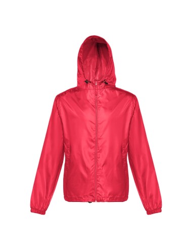 Coupe-vent pour enfant (unisexe) en taffetas 100% polyester (65 g/m²). Contient une capuche avec des bouchons de serrage et une 