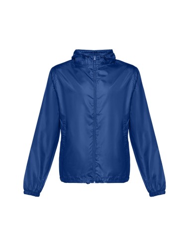 Coupe-vent pour enfant (unisexe) en taffetas 100% polyester (65 g/m²). Contient une capuche avec des bouchons de serrage et une 