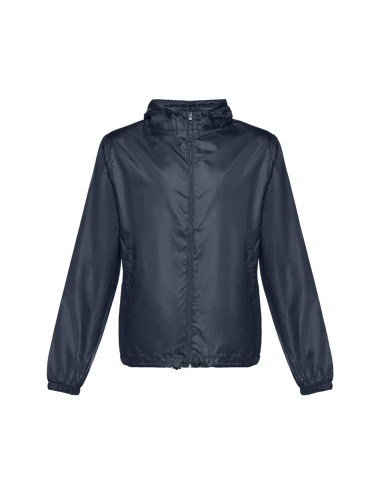 Coupe-vent pour enfant (unisexe) en taffetas 100% polyester (65 g/m²). Contient une capuche avec des bouchons de serrage et une 