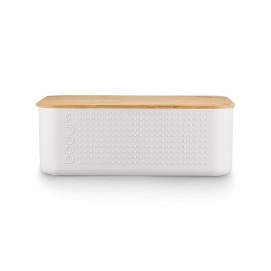 Boite à pain en matière sans BPA et couvercle bambou. Le couvercle en bambou peut également servir de planche à découper, avec d