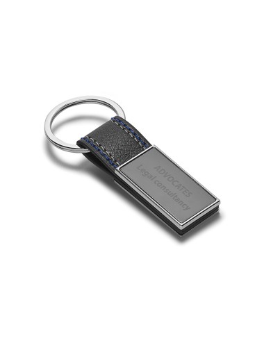 Porte-clés rond en métal et simili cuir. Livré sous coffret cadeau. 22 x 65 x 8 mm