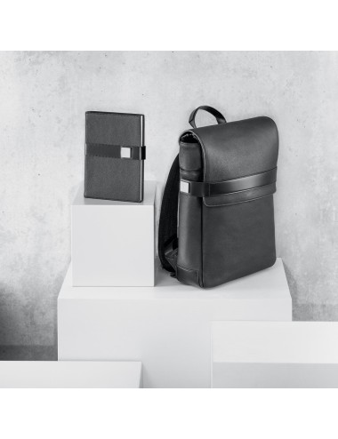 avec une touche professionnelle. La couverture rigide en simili cuir protège son intérieur