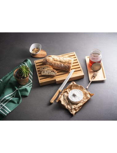 Planche à pain en bambou avec couteau inox. Grille amovible pour retirer les miettes facilement. Fourni dans une boîte cadeau en
