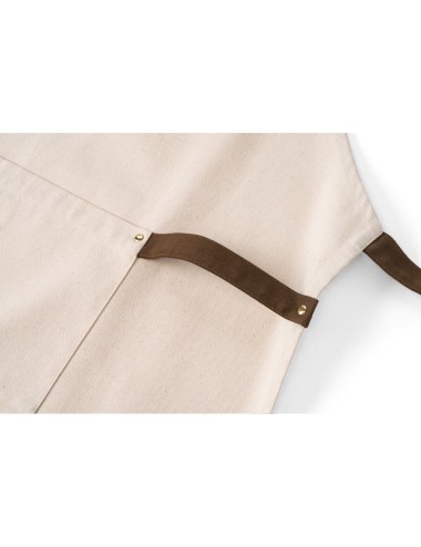 Tablier en toile 100% coton (320 g/m²) avec détails en métal. Avec 3 poches multifonctionnelles et une bande latérale (pour un s